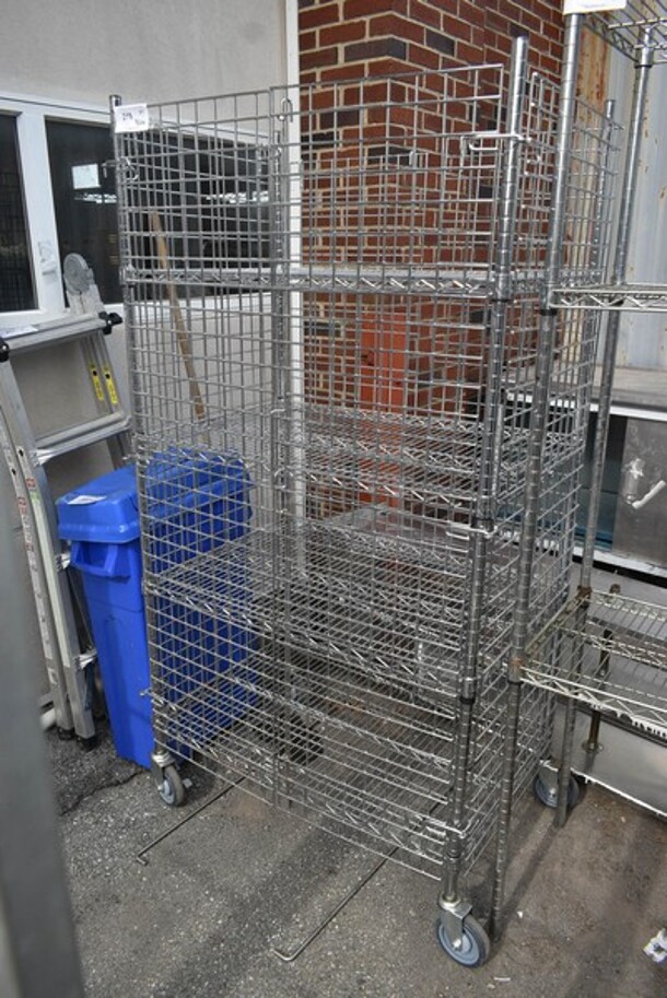 Chrome Finish 4 Tier Wire Shelving Unit w/ Liquor Cage on Commercial Casters. BUYER MUST DISMANTLE. PCI CANNOT DISMANTLE FOR SHIPPING. PLEASE CONSIDER FREIGHT CHARGES. 