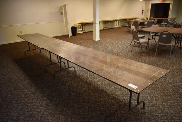 6 Wood Pattern Rectangular Folding Tables. 6 Times Your Bid! BUYER MUST REMOVE. (ballroom #2)