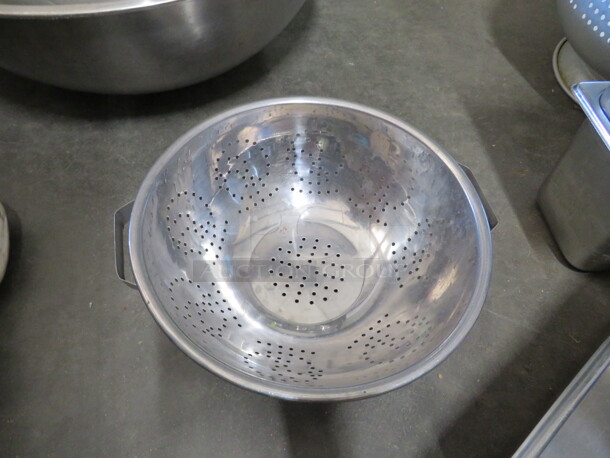 One Stainless Steel Colander.
