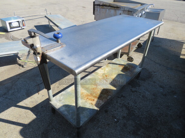 One Stainless Steel Table With Under Shelf And A 10lb Can Opener. 60X24X35