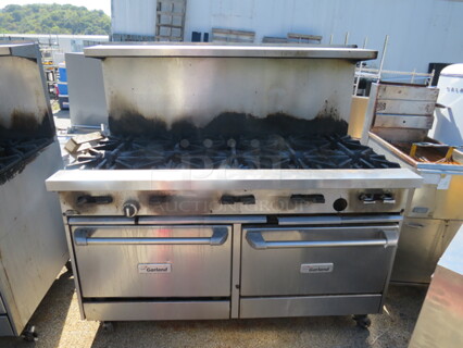 One Garland Natural Gas 10 Burner Range With Stainless Steel Over Shelf, 2 Racks On Casters. 59X34.5X56