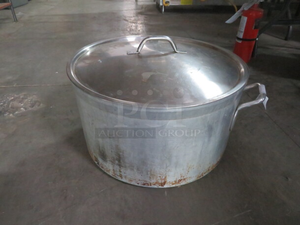 One Aluminum Stock Pot With A Stainless Steel Lid. 19X10.5