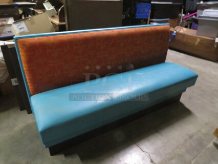 One Single Sided Cushioned Booth With Blue Seat ANd Multi Color Back. 72X26X36