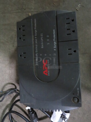 One APC UPS ES 500 Surge Protector.