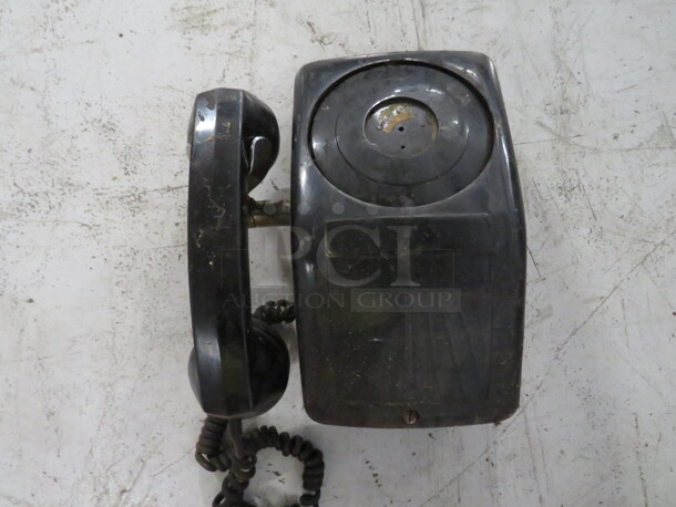One Vintage Wall Mount Phone.