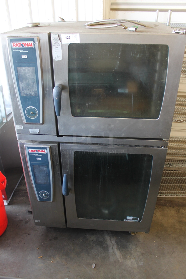 2 2013 Rational Stainless Steel Commercial Combitherm Self Cooking Center Convection Ovens on Commercial Casters. Bottom Door Needs To Be Reattached. Top Model: SCC WE 62. Bottom Model: SCC WE 102. 480 Volts, 3 Phase. 2 Times Your Bid!