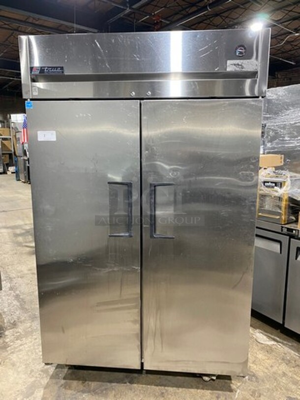 NICE! True Commercial 2 Door Reach In Cooler! With Poly Coated Racks And Pan Rack! All Stainless Steel! On Casters! Model: TG2R2S SN: 7325119 115V 1 Phase! Working When Removed!