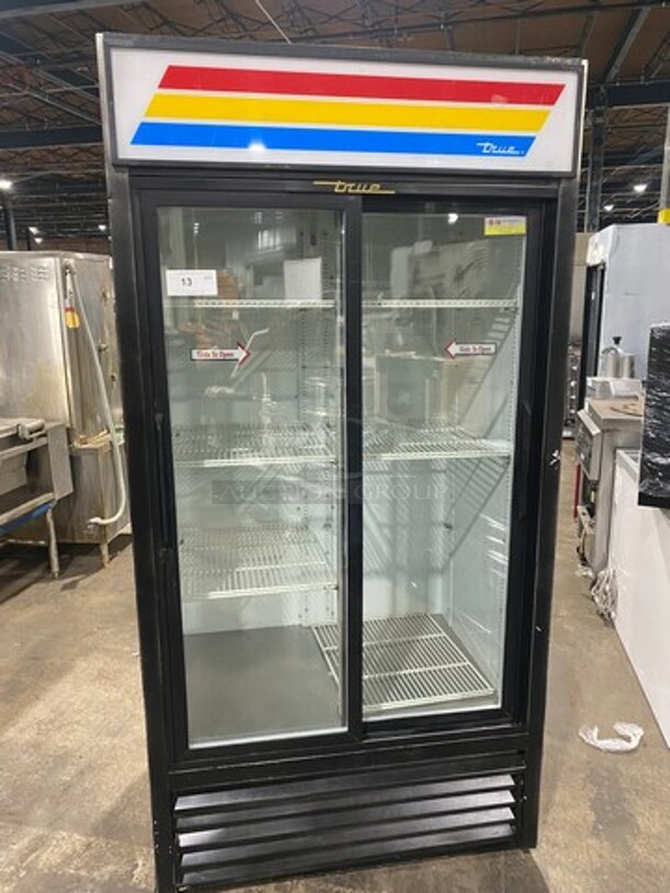 True Commercial 2 Sliding Door Reach In Refrigerator Merchandiser! With View Through Doors! With Poly Coated Racks! Model: GDM33 SN: 12312653 115V 60HZ 1 Phase