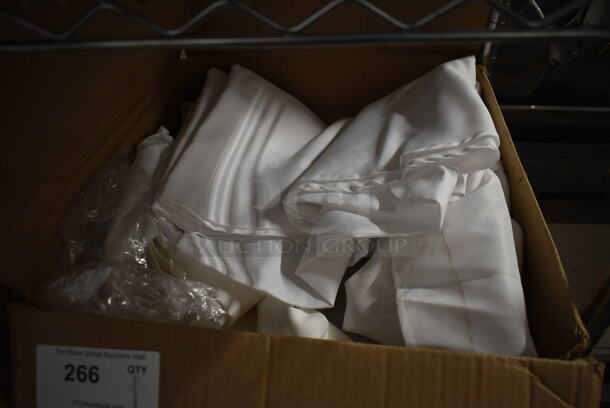 Box of White Tablecloths