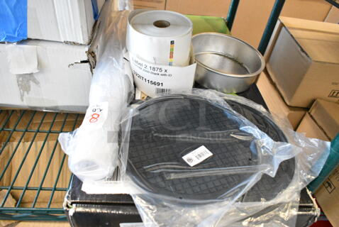 8 BRAND NEW SCRATCH AND DENT! Items Including 4 American Metalcraft TRVR8 8" Round Heat-Resistant Black Silicone Trivet, DayMark IT115691 DissolveMark 2" x 1" Blank Dissolvable Direct Thermal Label - 2000/Roll, 407CPAN62A Choice 6" x 2" Round Straight-Sided Aluminum Cake Pan, Estella 348PEDS61B Outer Lower Roller for EDS18S and EDS18D Dough Sheeters. 8 Times Your Bid! 