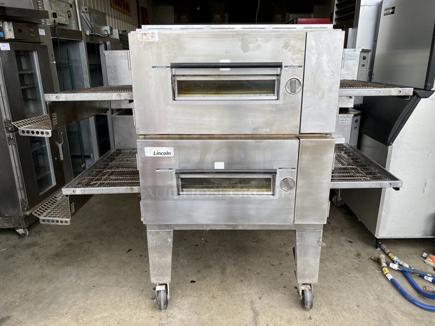 2 Lincoln Impinger Model 1600-000-U-K1968 Stainless Steel Commercial Natural Gas Powered Conveyor Pizza Oven on Commercial Casters. 90x65x64. 2 Times Your Bid!
