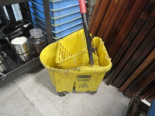 One Rubbermaid Mop Bucket And Wringer.