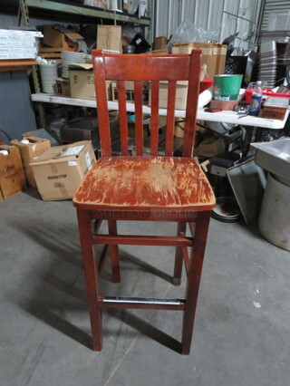 One Wooden Bar Height Chair.