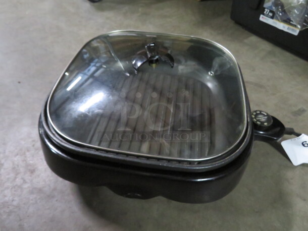 One Presto Electric Skillet With Lid.