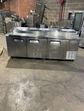 All Stainless Steel Commercial Refrigerated Pizza Prep Table. With 3 Door Refrigerated Storage Underneath! On Casters! 