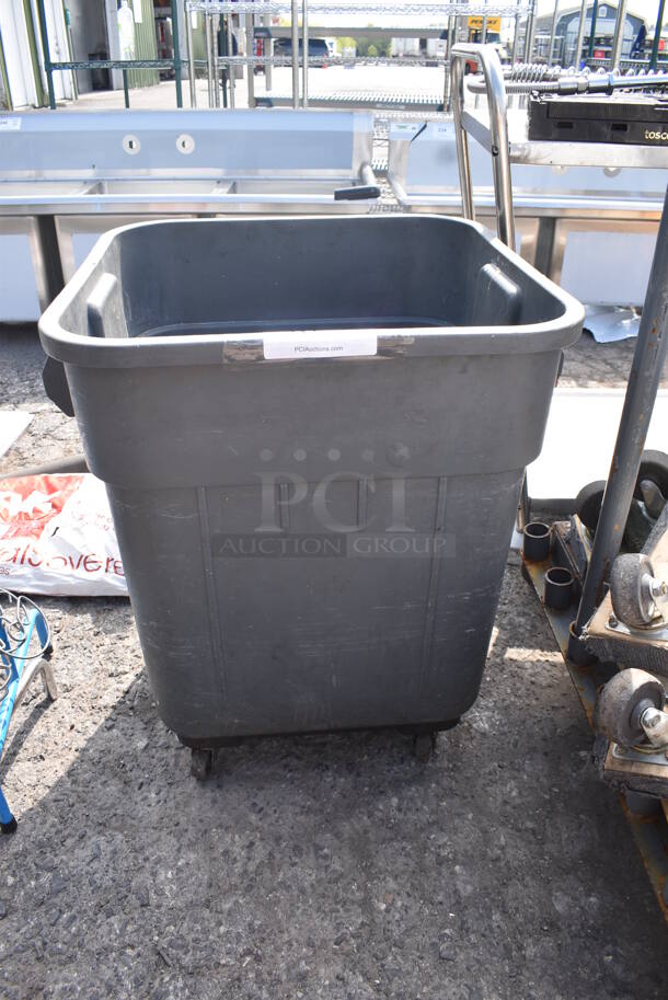 Gray Poly Trash Can on Commercial Casters.
