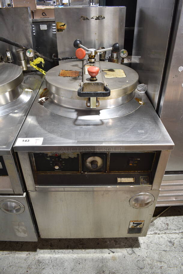 BKI FKM-F Stainless Steel Commercial Floor Style Pressure Fryer on Commercial Casters. 208 Volts, 3 Phase. 