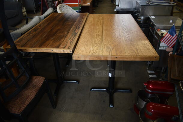 2 Wooden Dining Height Tables on Black Metal Table Bases. 2 Times Your Bid!