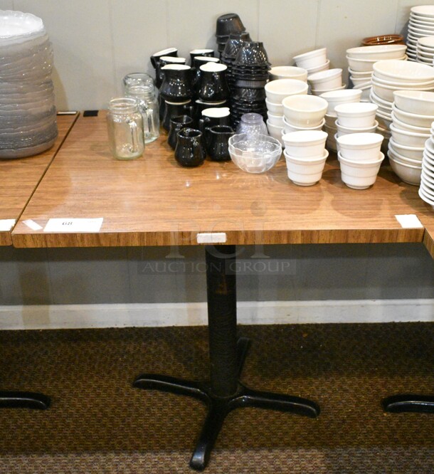 Wood Pattern Dining Height Table w/ Contents Including Ceramic Bowls, Cream Pitchers and Poly Bowls. (main dining room) - Item #1147308