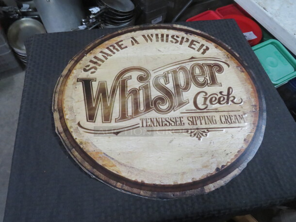 One 22 Inch Round Whisper Creek Tin Sign