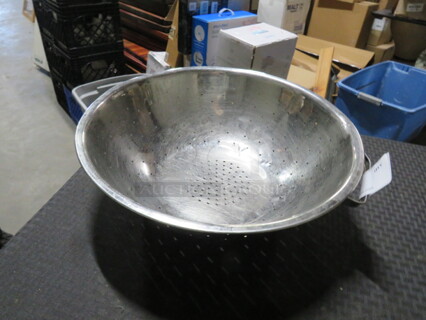 One 16 Inch Stainless Steel Colander.