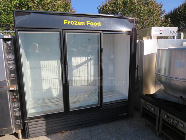 One 3 Door TRUE Glass Display Freezer With 12 Racks. Model# GDM-72F-LD. 115/208-230 Volt. 1 Phase. Dent On Top Panel. Unable To Test. 78X30X79. $10,532.16.