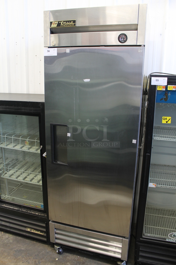 2016 True T-19F Stainless Steel Commercial Single Door Reach In Freezer w/ Poly Coated Racks on Commercial Casters. 115 Volts, 1 Phase. Tested and Powers On But Does Not Get Cold