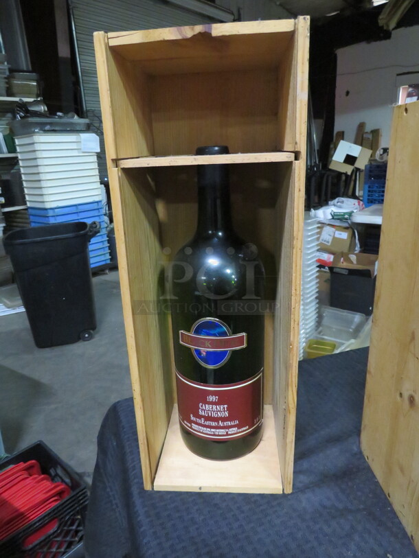 One Empty Wine Bottle In A Wooden Wine Box. 7.5X7X21