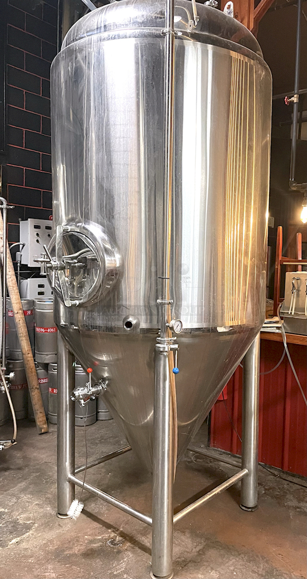 🍺 🍻  BEAUTIFUL!! Stout Tanks & Kettles - 15 BBL Fermenter / Unitank (Jacketed). 🍺 🍻                 Features: Easily Converts to a Unitank or Brite Serving Tank;
Glycol Jacketed - 2 Zones: Cone and Sidewall; 
Shadowless Manway for Easy Cleaning;
Adjustable Racking Arm for Clear Transfer;
1.5" Sample Valve for Quality Testing;
Back Mounted Pressure Gauge;
Adjustable Feet for Leveling on Uneven Floors or Fine Height Adjustments;
Pressure Gauge Type:  Back Mount;
CIP Arm and 2.5" Rotating CIP Spray Ball;
2 Butterfly Valves;
Rated to 2-Bar (29 PSI);
1/2" NPT Welded Thermowell for Contactless Temperature Probe
Tank Thickness: 3mm
Jacket and Outer Shell Thickness: 2mm.
Cone: 60 degree Interior Angle.
51.5-in. diameter x 125-in.H.