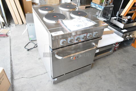 BRAND NEW SCRATCH AND DENT! Cooking Performance Group CPG 351ER24SC Stainless Steel Commercial 24" 4-Burner Electric Range with Space Saver Oven. 208 Volts, 3 Phase.