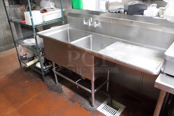 Advance Tabco FC-2-2424-18 Two Compartment Stainless Steel Commercial Sink with One Right Side Drainboard - 68 1/2" Includes Twist Handle Waste Valve Setups. 