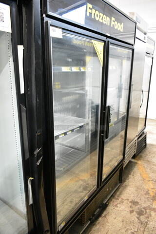 True GDM-49F-LD Metal Commercial 2 Door Reach In Freezer Merchandiser w/ Poly Coated Racks. 115/208-230 Volts, 1 Phase. 