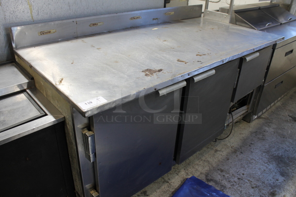 Leader DR72 S/C Stainless Steel Commercial 3 Door Work Top Cooler w/ Back Splash on Commercial Casters. 115 Volts, 1 Phase. Tested and Powers On But Does Not Get Cold