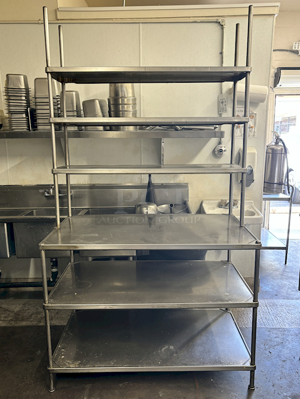 NICE! Stainless Steel Prep/Work Table With (3) Shelves Above and (2) Below. 48x24x68