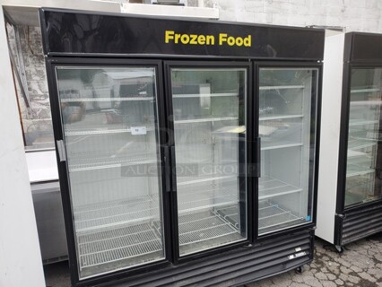 True 3 Door Merchandiser Freezer
Good Working Condition 
On Casters