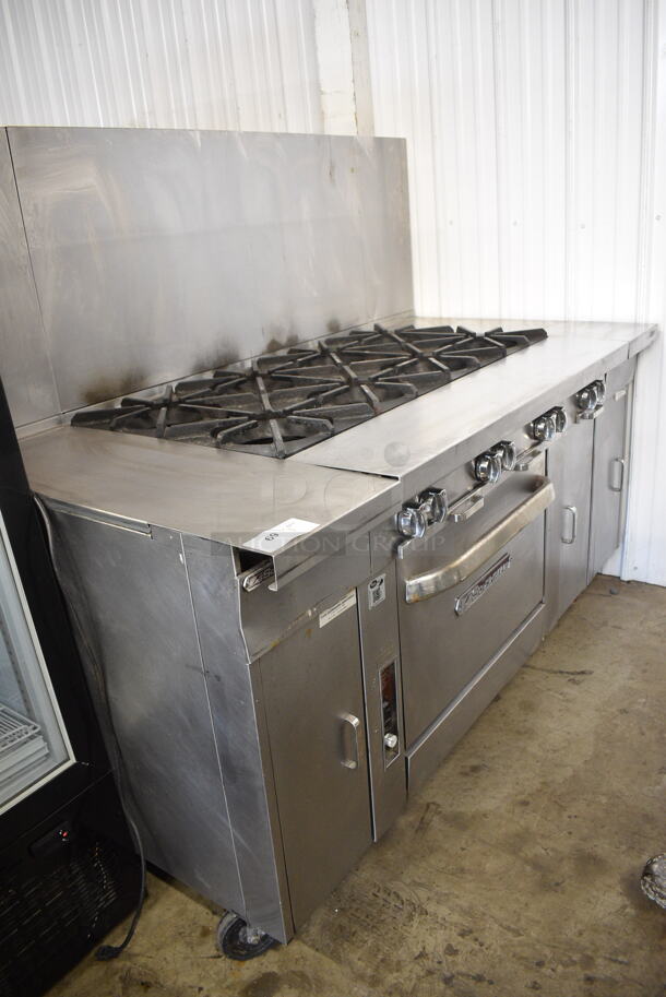 Southbend P48A-BBBB Stainless Steel Commercial Natural Gas Powered 8 Burner Range w/ Convection Oven, Side Counters and Back Splash on Commercial Casters.