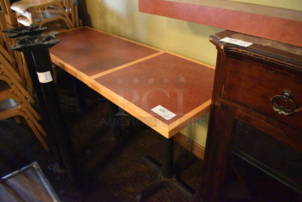 2 Brown Tables on Metal Table Base. BUYER MUST REMOVE. 44x24x30, 24x24x30. 2 Times Your Bid! (Susquehanna Ale House)