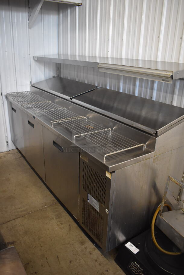 Randell 8395N Stainless Steel Commercial Pizza Prep Station w/ Over Shelf on Commercial Casters. 115 Volts, 1 Phase. 95x35x57. Picture of the Unit Before Removal Is Included In the Listing. Tested and Working!