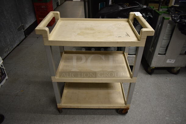 Tan Poly 3 Tier Cart w/ Push Handles on Commercial Casters. (dish room)