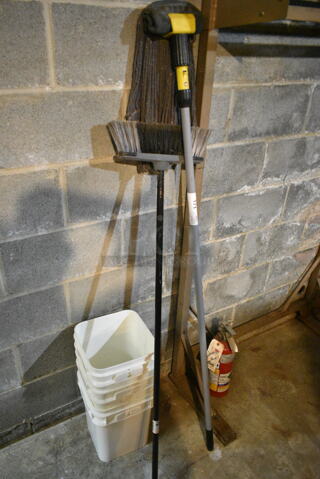 2 Items Including Mop and Broom. 2 Times Your Bid! (basement) 