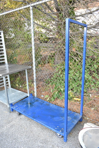 Blue Metal Flat Cart on Commercial Casters. 