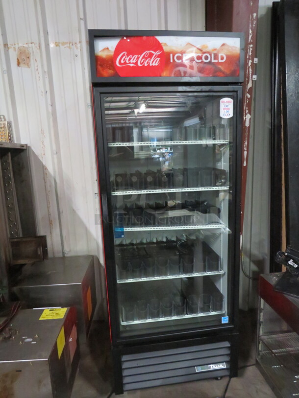 One True 1 Door Refrigerator Glass Door Merchandiser With 5 Racks, With Soda Racking On Casters. WORKING WHEN REMOVED.  Model# GDM-26-HC-TSLD1. 115 Volt. 30X32X81.5