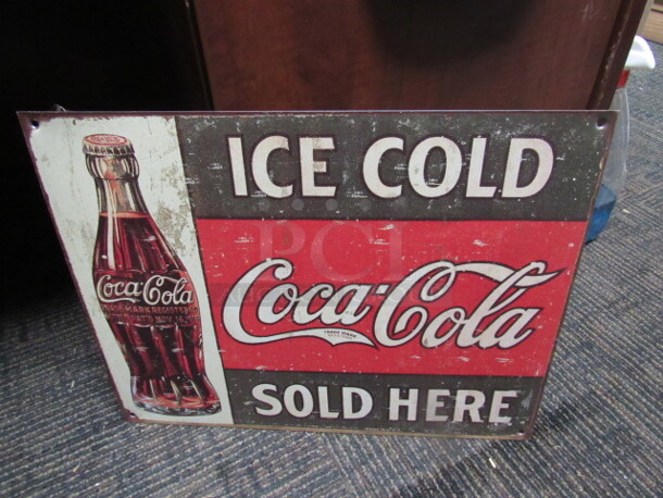 One 16X12 Coca Cola Tin Sign.