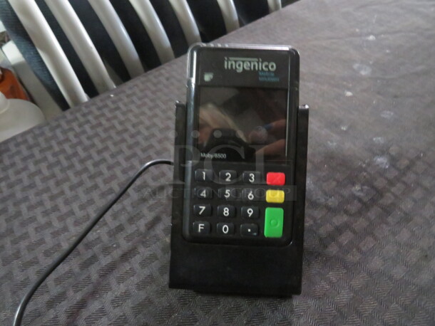 One Ingenico Card Reader. #moby 8500.