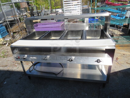 One Serve Well 4 Well Steam Table With Under Shelf, Over Shelf, And Cutting Board. Model# 38104. 120 Volt. 61X33X47.5. $2323.40.