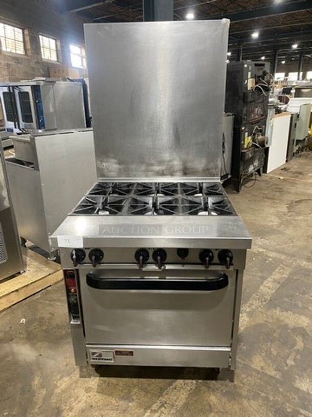 Southbend Commercial Natural Gas Powered 6 Burner Stove! With Raised Back Splash! With Oven Underneath! All Stainless Steel! On Casters!