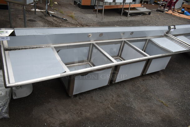 BRAND NEW SCRATCH AND DENT! Regency 600S32424224 Stainless Steel Commercial 3 Bay Sink w/ Dual Drain Boards and Legs. Bays 24x24. Drain Boards 26x22.5