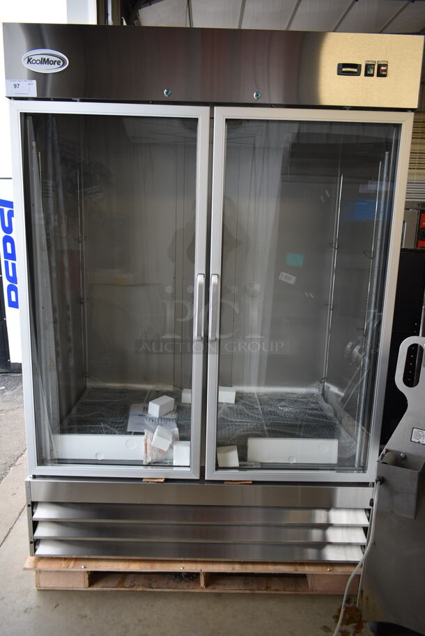 BRAND NEW SCRATCH AND DENT! KoolMore RIR-2D-GD Stainless Steel Commercial 2 Door Reach In Cooler Merchandiser w/ Poly Coated Racks. 115 Volts, 1 Phase. Tested and Working!