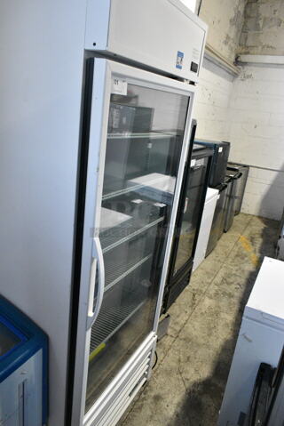 2021 True TSCI-600R-G-PH Metal Commercial Single Door Reach In Cooler Merchandiser. 115 Volts, 1 Phase.