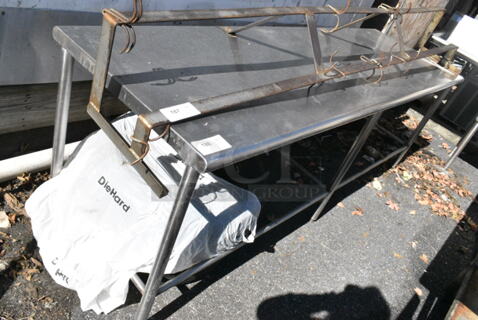 Stainless Steel Table w/ Metal Under Shelf. Does Not Come w/ Contents. (out back)